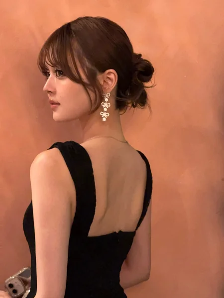 Japanese Low Bun Updo Hairstyle for Formal Wear