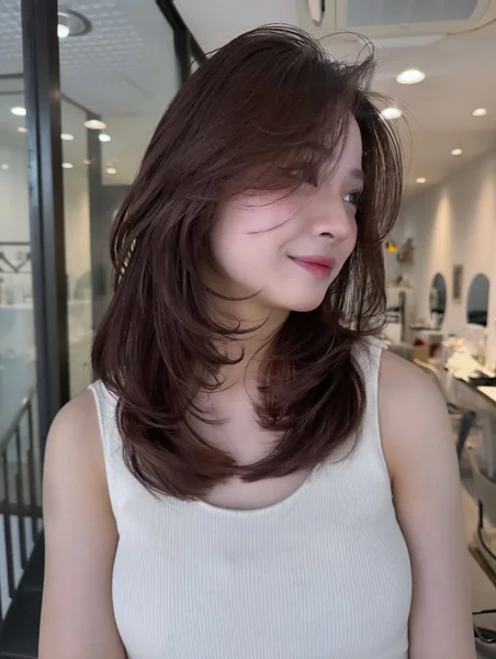 Japanese Medium Layered Hairstyle with Side Bangs