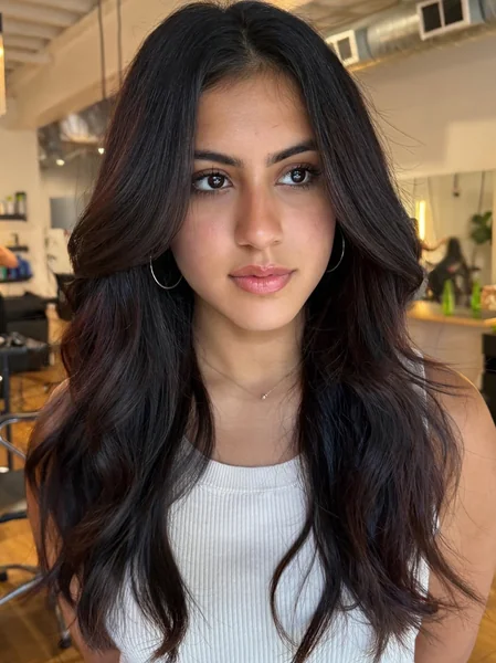 Oval Layered Haircut Medium with Warm Tones