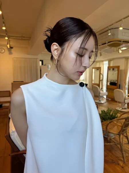 Japanese Low Bun Hairstyle with Wet-Look Finish