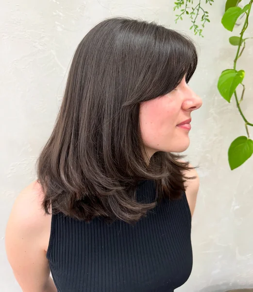 Medium Length Layers for Round Face