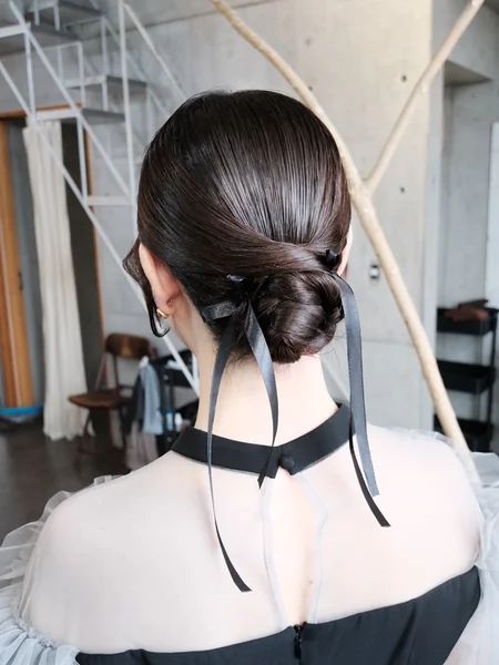 Low Bun with Grey Ribbon Bow