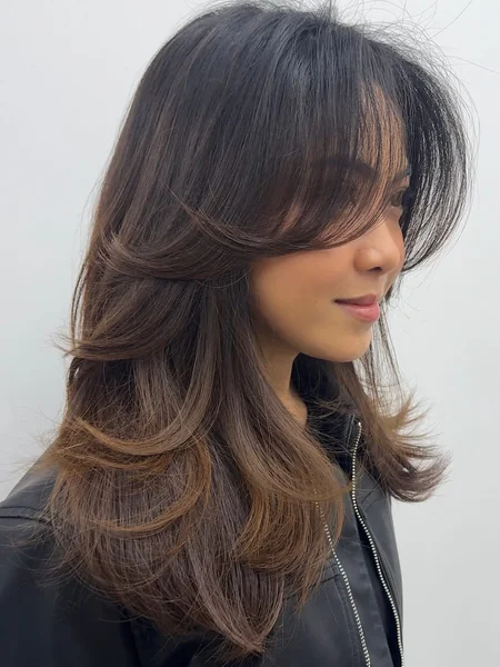 Long Wavy Face-Framing Haircut