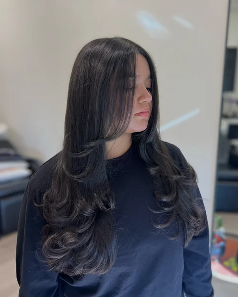 Framing Face Haircut with Curled Ends