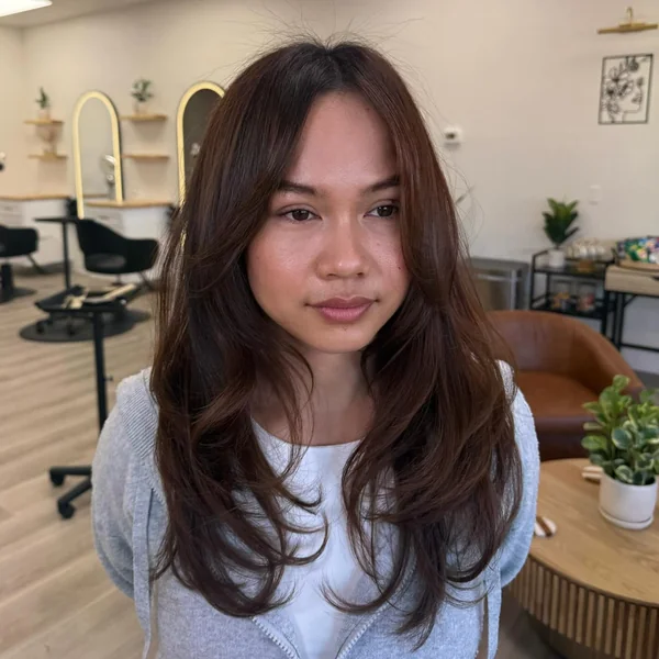Oval Face Layered Haircut with Natural Waves