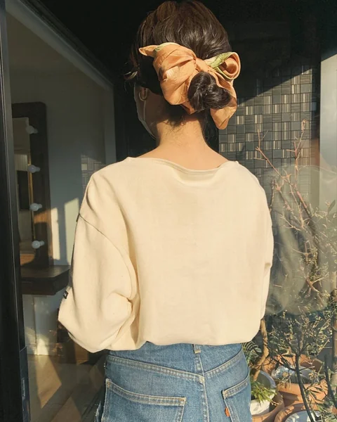 Low Bun with Oversized Scarf Bow