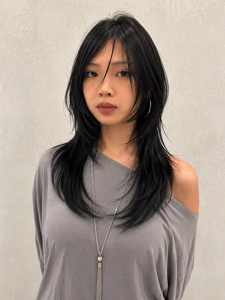Japanese Long Layered Hairstyle with Edgy Bangs