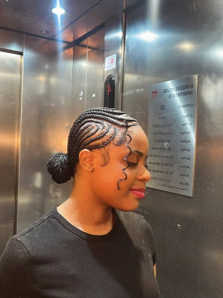 Swirl Cornrows Low Bun