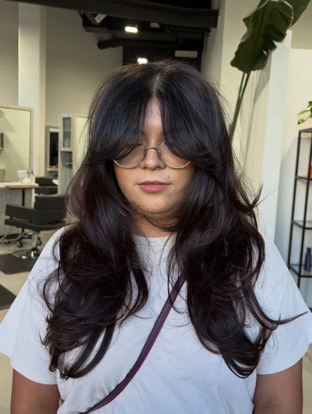 Long Octopus Cut with Swooping Curtain Bangs