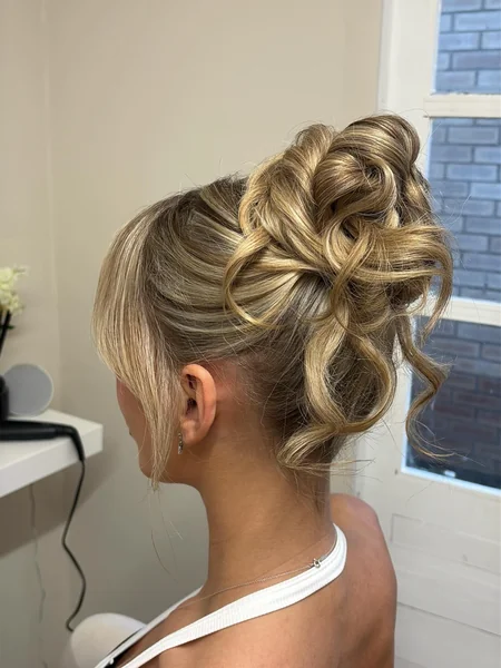 Messy Curly High Bun for Reception