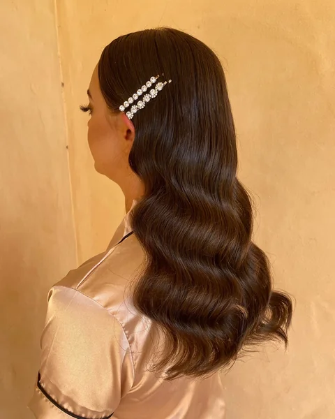 Sleek Side-Swept Waves with Hair Clips