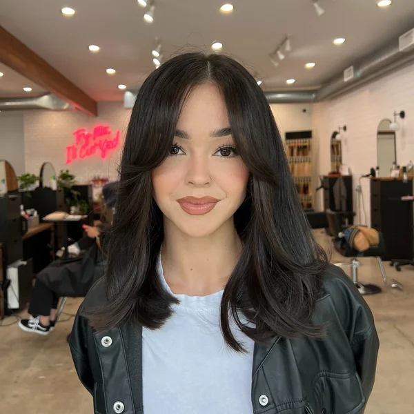 Layered Haircut Oval Face with Soft Fringe