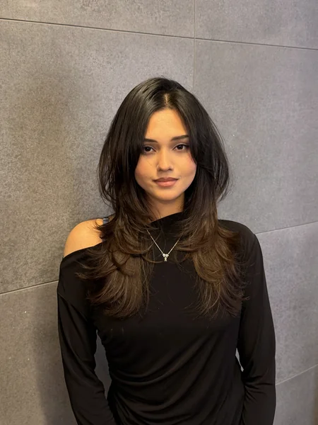 Oval Layered Haircut with Long Flowing Layers