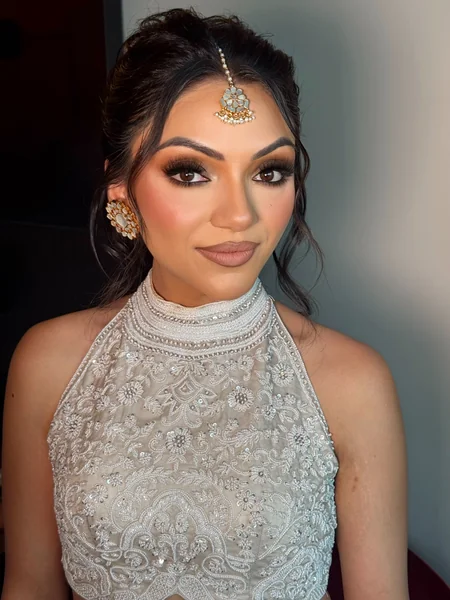 Close-Up Updo with Maang Tikka for Reception