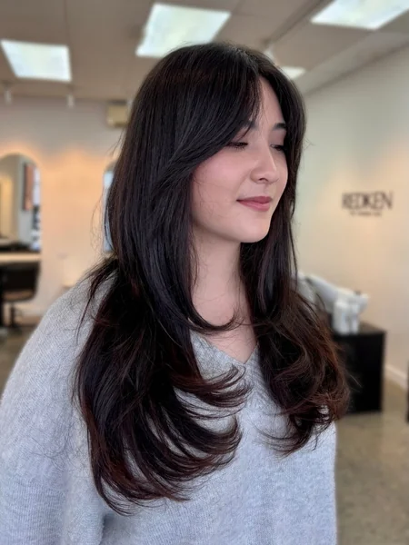 Oval Long Layered Haircut in Deep Brunette