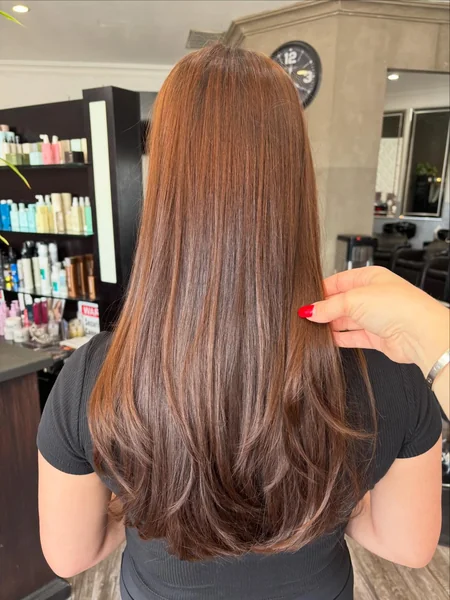 Long Layered Haircut with Copper Tones