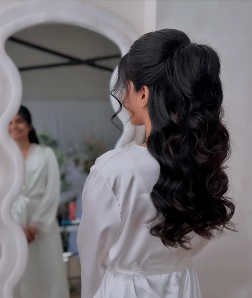 Half-Up Wavy Hairstyle for Reception Lehenga