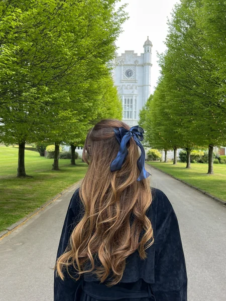 Half-Up Style with Navy Ribbon Bow