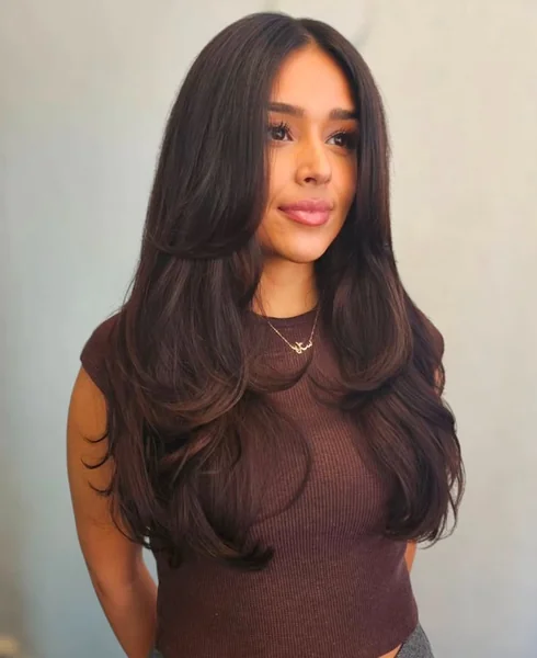 Oval Layered Haircut with Voluminous Curls