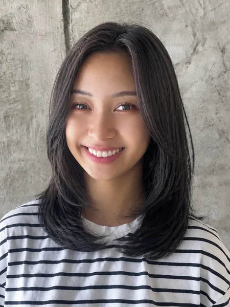 Layered Oval Haircut with Natural Texture