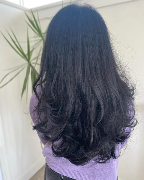U-Shaped Haircut with Voluminous Curled Layers