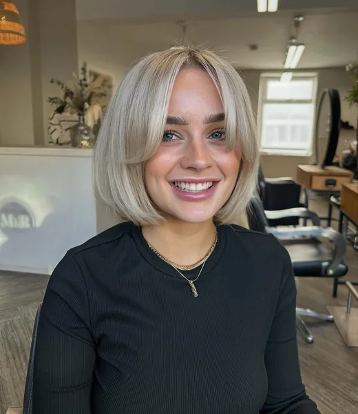 Chin Length Ash Blonde Bob With Curtain Bangs