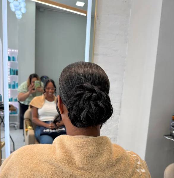 Sleek Twisted Low Bun for Black Women