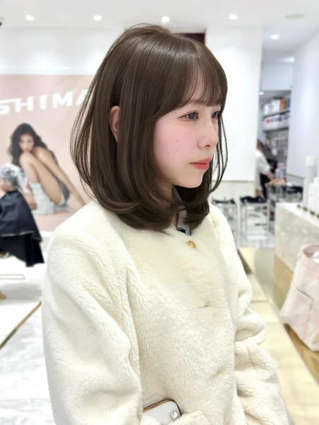 Layered Medium Bob with Bangs