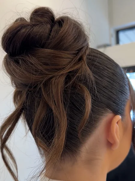 Wavy Blonde Slickback Ponytail