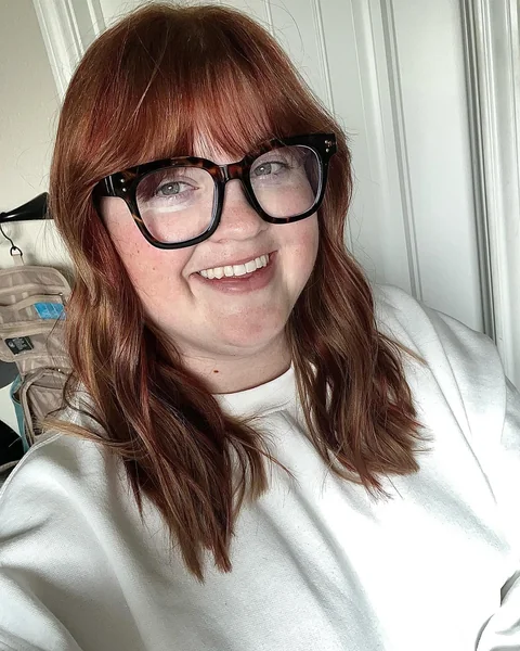 Wavy Lob with Bangs in Auburn