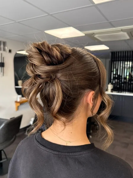 Twisted Top Knot with Tendrils