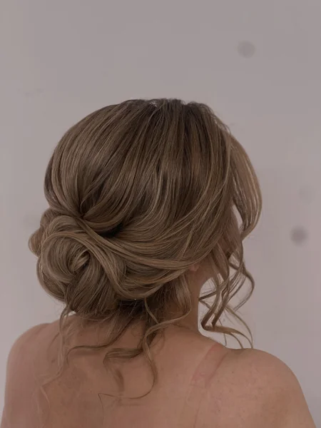Sleek Chignon With Wavy Strands