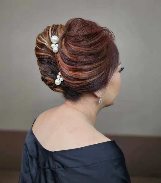 Elegant French Twist Updo with Pearls