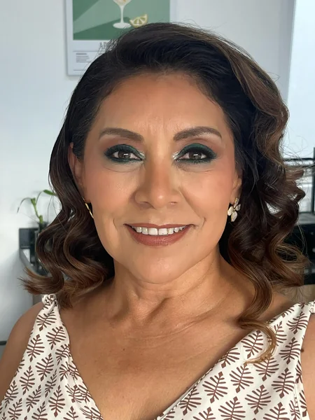 Glossy Side-Swept Curls
