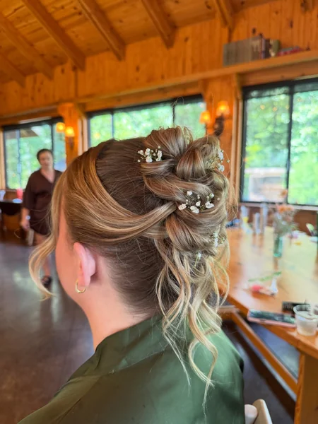 Twisted Bridesmaid Updo with Baby's Breath