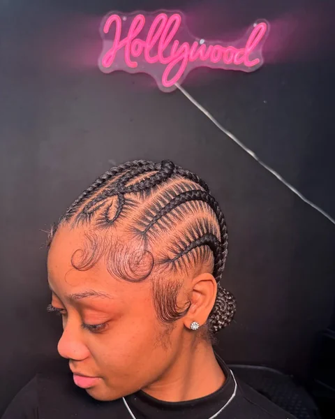 Heart Stitch Cornrows Into Low Bun