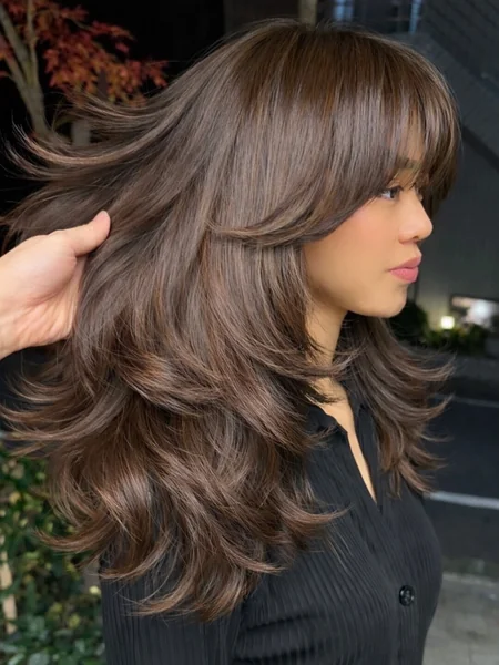 Butterfly Layers with Face-Framing Bangs