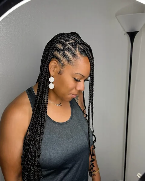 Tribal Knotless Braids With Curly Ends