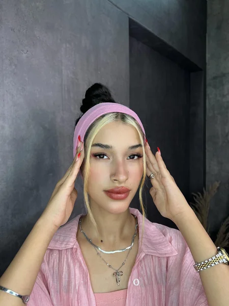 Pink Headband With Top Bun