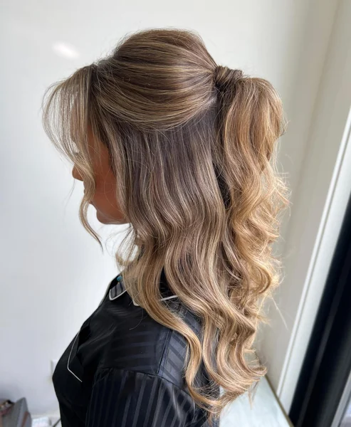 Half Up Ponytail with Curtain Bangs