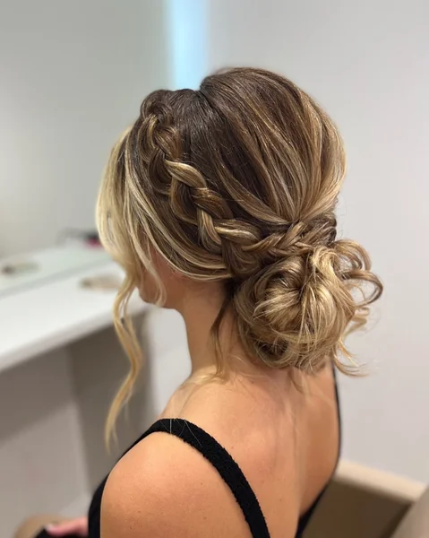 Messy Low Bun with Side Braid