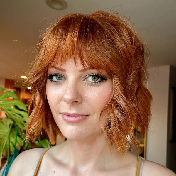Copper Wavy Bob with Full Bangs