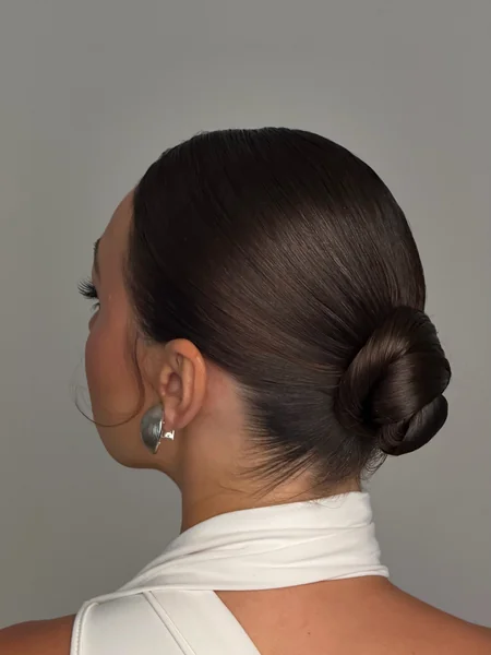 Dark Brunette Slickback Low Bun