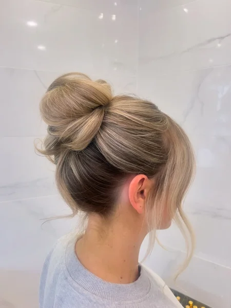 Messy Top Knot with Loose Strands