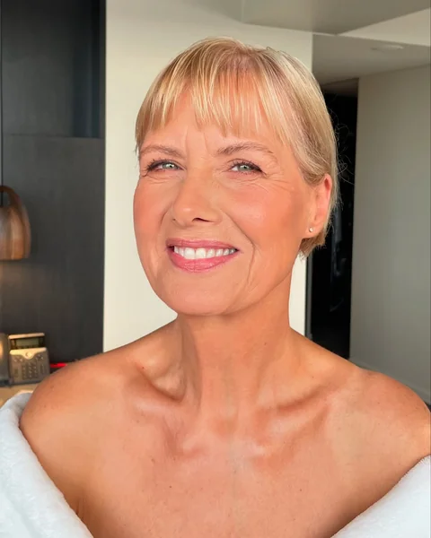 4. Short Blonde Crop with Straight Bangs