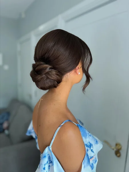 Low Twisted Bun for Wedding Guests