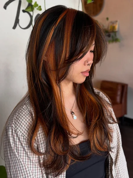 Copper Streaks with Side-Swept Bangs