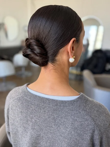 Slickback Bun with Pearl Earring
