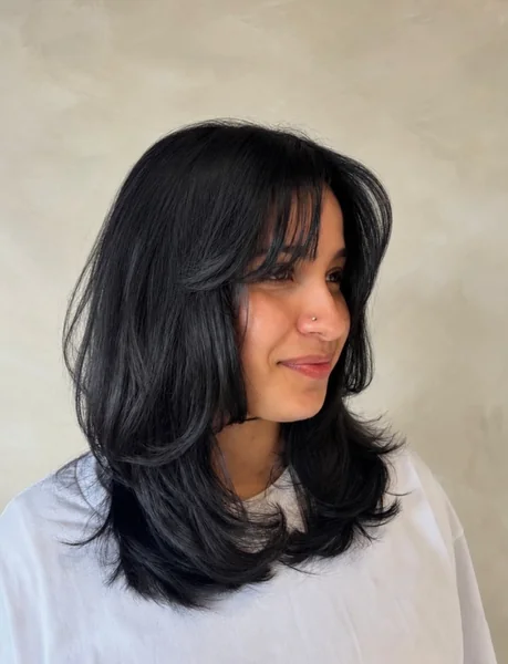 Black Layered Cut with Curtain Bangs