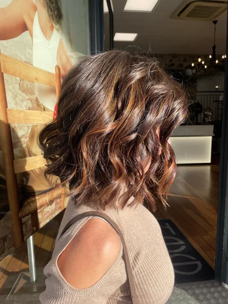 Copper-Lit Bob for Thick Wavy Hair